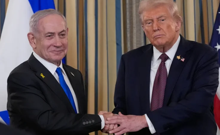 Israel's Prime Minister Benjamin Netanyahu shakes hands with President Donald Trump after a news conference in the State Dining Room of the White House, Monday, Sept. 29, 2025, in Washington. (AP Photo/Alex Brandon)