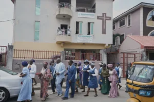 People walk past the Christian Mission for the Deaf church in Lagos, Nigeria, Sunday, July 13, 2025. (AP Photo/Sunday Alamba) Christian persecution
