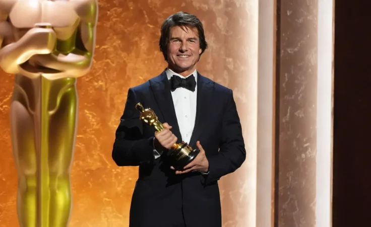 Tom Cruise, winner of an Academy honorary award poses onstage during the 16th Governors Awards on Sunday, Nov. 16, 2025, at The Ray Dolby Ballroom in Los Angeles. (AP Photo/Chris Pizzello)