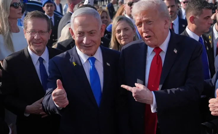President Donald Trump poses for a photo with Israel's Prime Minister Benjamin Netanyahu before he boards Air Force One at Ben Gurion International Airport, Monday, Oct. 13, 2025, near Tel Aviv, as Israel's President Isaac Herzog watches at left. (AP Photo/Evan Vucci)
