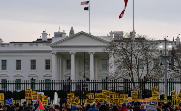 Protesters rally outside the White House Saturday, Jan. 3, 2026, in Washington, after the U.S. captured Venezuelan President Nicolás Maduro and his wife in a military operation. (AP Photo/Julia Demaree Nikhinson)