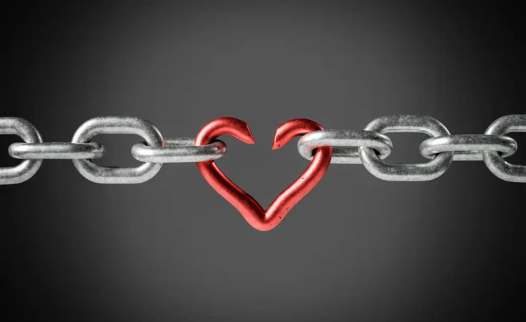 Broken chain shaped as a heart on gray background. By AntonioSolano/stock.adobe.com. Philip Yancey