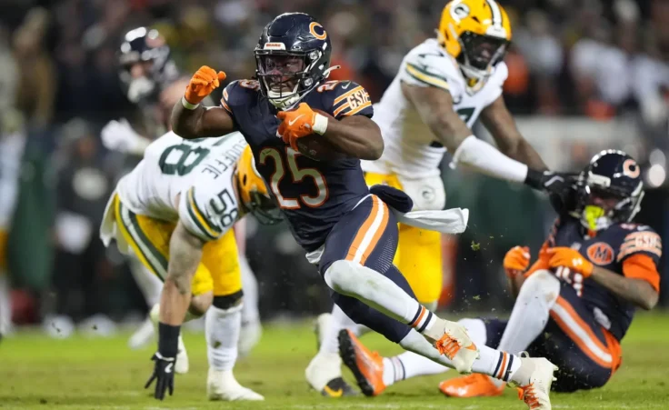 Chicago Bears' Kyle Monangai runs during the second half of an NFL wild-card playoff football game against the Green Bay Packers Saturday, Jan. 10, 2026, in Chicago. (AP Photo/Nam Huh)