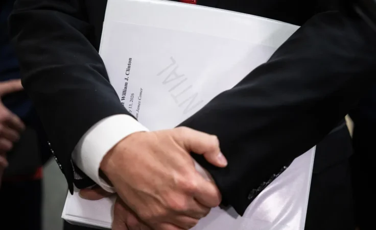 House Oversight Committee Chair James Comer (R-Ky.) holds a binder as he speaks with reporters after former President Bill Clinton did not appear for a deposition on Capitol Hill Jan. 13, 2026. (Francis Chung/POLITICO via AP Images)