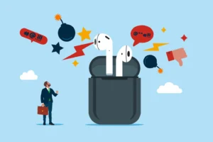 Wireless headphones shouting with negative feedback from podcast at tiny businessman. By Vadym/stock.adobe.com. Jennifer Welch