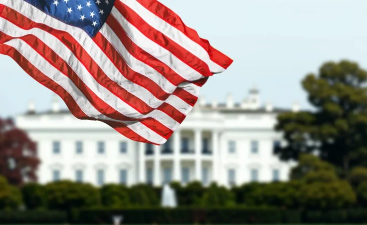 United States White House silhouette with US flag. By BillionPhotos.com politics
