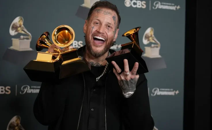 Jelly Roll poses in the press room with the award for best contemporary country album for "Beautifully Broken" during the 68th annual Grammy Awards on Sunday, Feb. 1, 2026, in Los Angeles. (Photo by Richard Shotwell/Invision/AP)