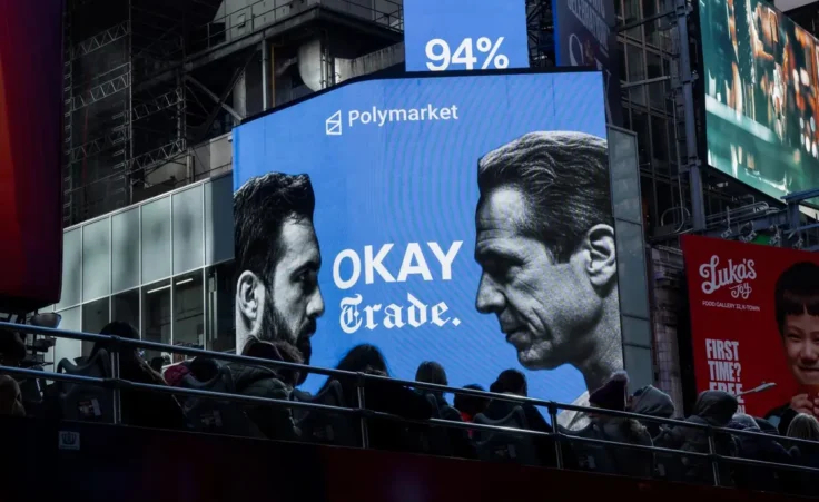 An advertisement by the American company Polymarket show Zohran Mamdani and Andrew Cuomo ahead of the New York City mayoral election on Tuesday, Nov. 4, 2025, in New York. (AP Photo/Olga Fedorova)