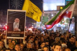 Iraqi Shiite hold a symbolic funeral for Iranian Supreme Leader Ayatollah Ali Khamenei, who was killed by a U.S. airstrike in Tehran, in Najaf, Iraq, Wednesday, March 4, 2026. (AP Photo/Anmar Khalil) Iran war