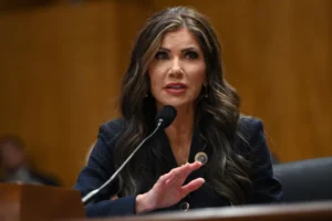 Kristi Noem, President-elect Donald Trump's nominee for Secretary of the Department of Homeland Security, speaks during her confirmation hearing before the Homeland Security and Governmental Affairs Committee on Capitol Hill on January 17, 2025 in Washington, DC. (Photo by Chen Mengtong/China News Service/VCG via AP)