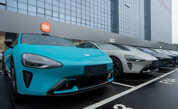 Shenzhen, Guangdong, China - Apr 8, 2024: Rows of Xiaomi's new Su7 electric cars are seen at its delivery and service center in Shenzhen, Guangdong Province, China. By Tada Images/stock.adobe.com