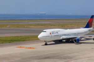 Large Delta airlines flight Boeing 747-451 at Chubu Centrair International Airport in Nagoya, Japan. By SNEHITPHOTO/stock.adobe.com. Good Friday