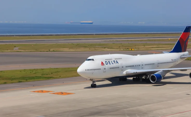 Large Delta airlines flight Boeing 747-451 at Chubu Centrair International Airport in Nagoya, Japan. By SNEHITPHOTO/stock.adobe.com. Good Friday