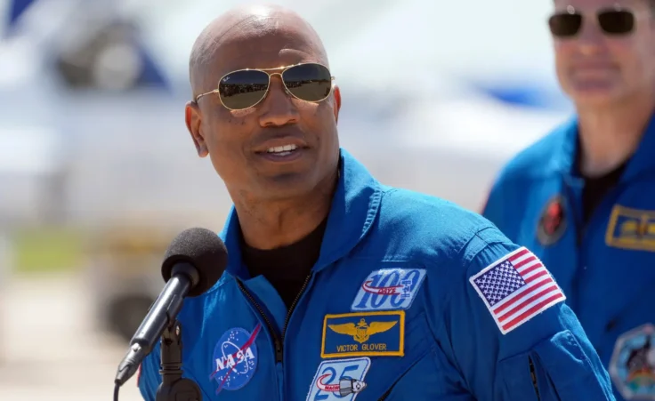 Artemis 2 crew member, pilot Victor Glover speaks to the media after the crew's arrival at the Kennedy Space Center Friday, March 27, 2026, in Cape Canaveral, Fla. (AP Photo/Chris O'Meara)