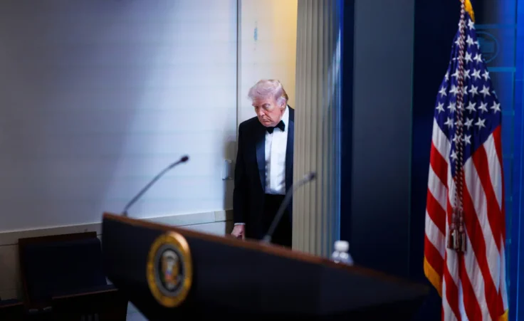 President Donald Trump arrives at the James Brady Press Briefing Room at the White House after a shooting incident outside the ballroom at the annual White House Correspondents' Association Dinner in Washington, Saturday, April 25, 2026. (AP Photo/Tom Brenner)