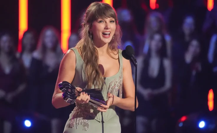 Taylor Swift accepts the award for Pop Album of the Year during the IHeartRadio Music Awards on Thursday, March 26, 2026, at the Dolby Theatre in Los Angeles. (AP Photo/Chris Pizzello)