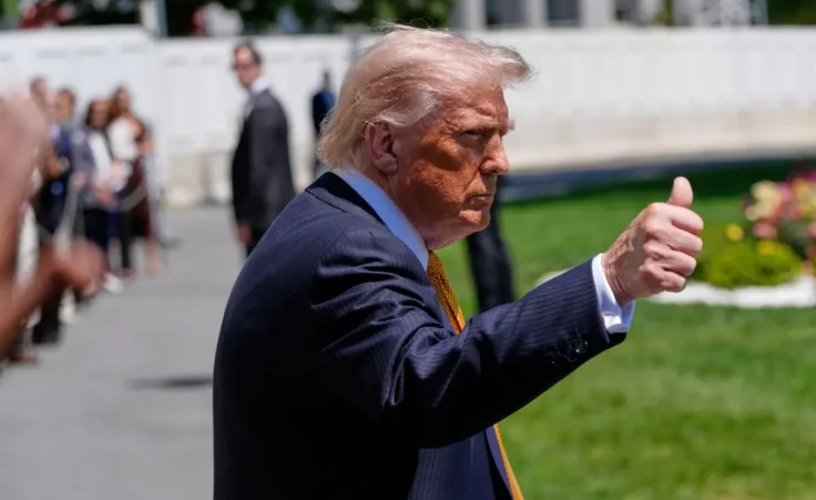 President Donald Trump gives a thumbs up as he leaves the White House for travel to Beijing, Tuesday, May 12, 2026, in Washington, to meet with China's President Xi Jinping. (AP Photo/Manuel Balce Ceneta)