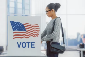A Black woman voting on Election Day in the United States. By Gorodenkoff/stock.adobe.com. congressional maps Alabama