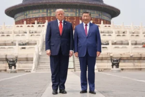 President Donald Trump, left, stands with Chinese President Xi Jinping at the Temple of Heaven on Thursday May 14, 2026, in Beijing. (AP Photo/Mark Schiefelbein)