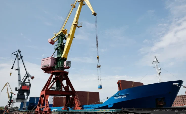 A crane unloads metal rolls from cargo ship Kholmogory arrived from Russian St. Petersburg at the port of Kaliningrad, Russia, Thursday, June 30, 2022. The ship has start carrying cargo between St. Petersburg and Russia's Baltic exclave of Kaliningrad following restrictions on cargo transit there introduced by Lithuania in line with the European Union's sanctions against Russia. (AP Photo) Russian ghost ship fleet nuclear