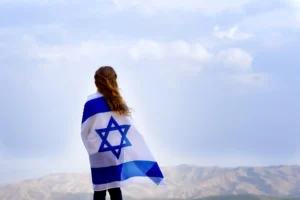 Little patriot jewish girl looking out at a valley in Israel. By Inna/stock.adobe.com. Nicholas Kristof