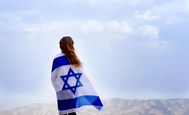 Little patriot jewish girl looking out at a valley in Israel. By Inna/stock.adobe.com. Nicholas Kristof