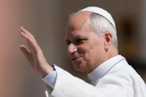 Pope Leo XIV waves as he arrives for his weekly general audience in St. Peter's Square at the Vatican, Wednesday, May 27, 2026. (AP Photo/Alessandra Tarantino) Pope AI encyclical