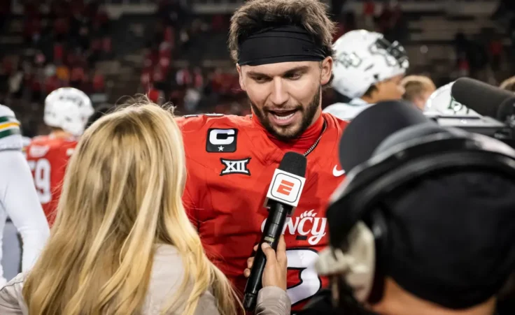 FILE - Cincinnati quarterback Brendan Sorsby (2) is interviewed after a NCAA college football game against Baylor, Oct. 25, 2025, in Cincinnati. (AP Photo/Tanner Pearson, File)