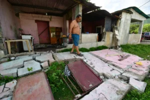 A man walks over the fallen walls of his home in Moron, near the epicenter of two earthquakes that struck Venezuela the day before, Thursday, June 25, 2026. (AP Photo/Jacinto Oliveros) San Andreas fault line at thousand year high