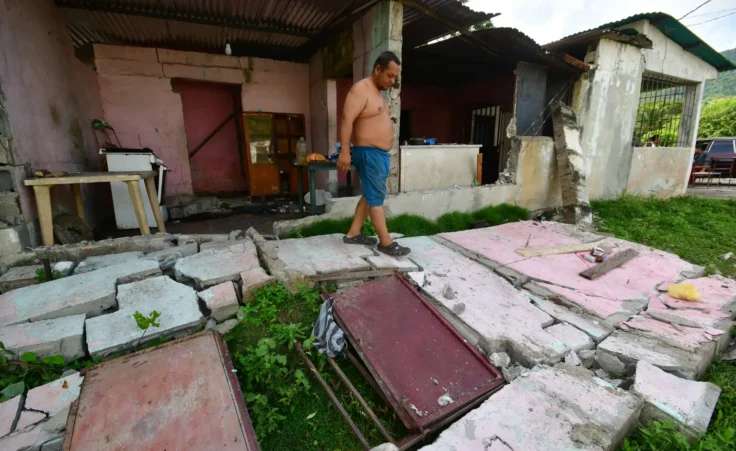 A man walks over the fallen walls of his home in Moron, near the epicenter of two earthquakes that struck Venezuela the day before, Thursday, June 25, 2026. (AP Photo/Jacinto Oliveros) San Andreas fault line at thousand year high