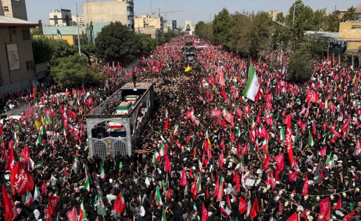 A truck carrying the coffins of the late Iranian Supreme Leader Ayatollah Ali Khamenei and members of his family makes its way through mourners during the funeral procession in Tehran, Iran, Monday, July 6, 2026. (AP Photo/Vahid Salemi) Trump ceasefire ended