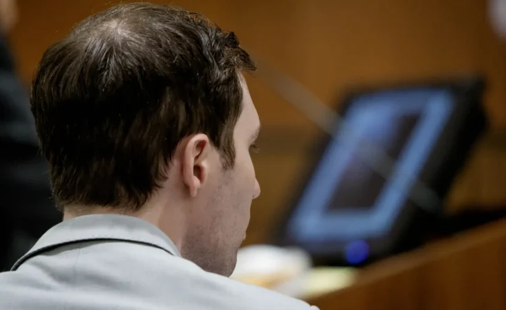 Tyler Robinson, who is accused in the fatal shooting of Charlie Kirk, watches a computer screen during testimony about comparison testing of bullets during a preliminary hearing at the Fourth District Courthouse in Provo, Utah, Thursday, July 9, 2026. (AP Photo/Spenser Heaps, Pool)