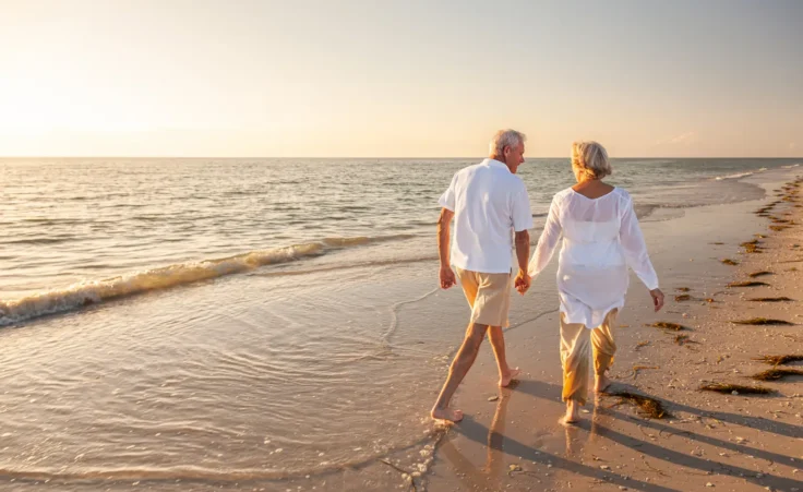 Happy older couple walking on the beach holding hands. By DarrenBaker/stock.adobe.com. A perceptive article about finding purpose that matters most
